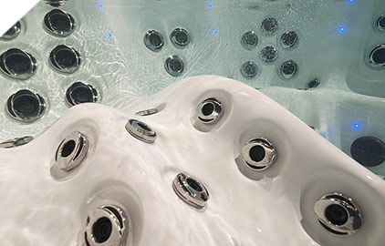 Egonomically designed hot tub seats