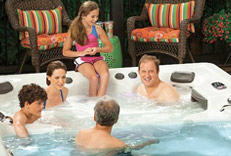 A family in a swim spa enjoying their time together